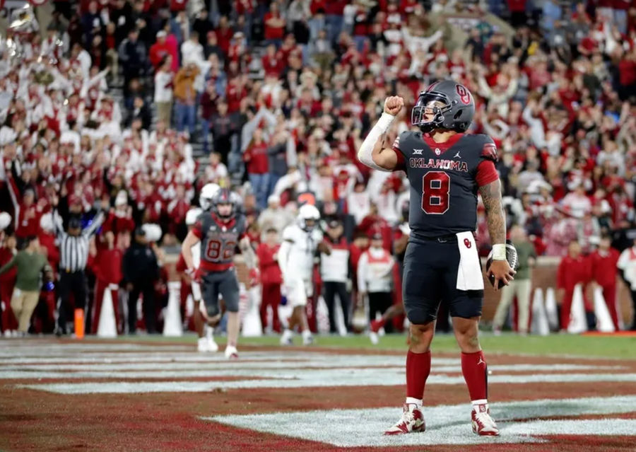 Oklahoma's Dillon Gabriel (8) reacts after scoring a touchdown in the second half of a college football game between the University of Oklahoma Sooners and the West Virginia Mountaineers at Gaylord Family-Oklahoma Memorial Stadium in Norman, Okla., Saturday, Nov., 11, 2023. credits: SARAH PHIPPS/THE OKLAHOMAN / USA TODAY NETWORK