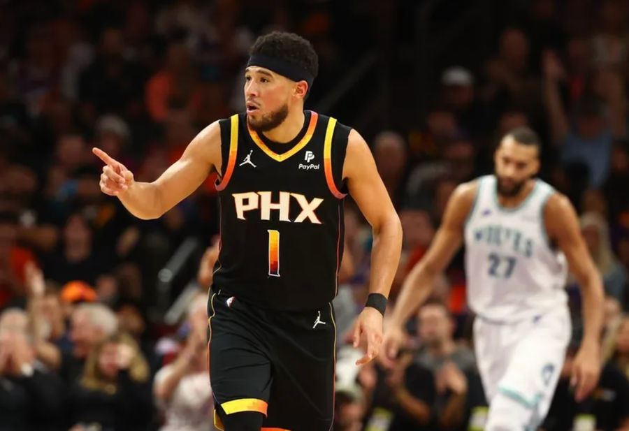 Nov 15, 2023; Phoenix, Arizona, USA; Phoenix Suns guard Devin Booker (1) reacts against the Minnesota Timberwolves in the second half at Footprint Center. credits: Mark J. Rebilas-USA TODAY Sports