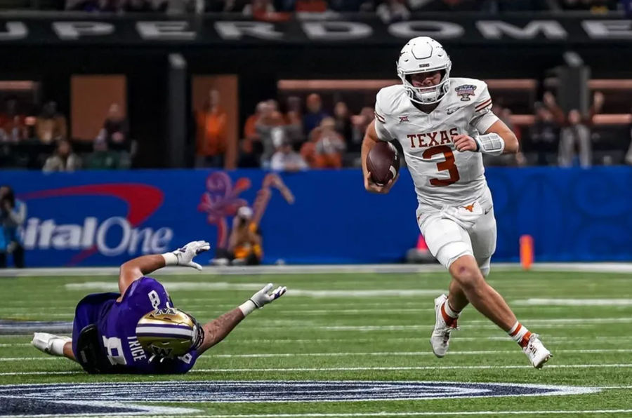Texas Longhorns quarterback Quinn Ewers (3) evades a tackle by Washington edge Bralen Trice (8) during the Sugar Bowl College Football Playoff semifinals game at the Caesars Superdome on Monday, Jan. 1, 2024 in New Orleans, Louisiana. credits: Aaron E. Martinez/American-Statesman / USA TODAY NETWORK