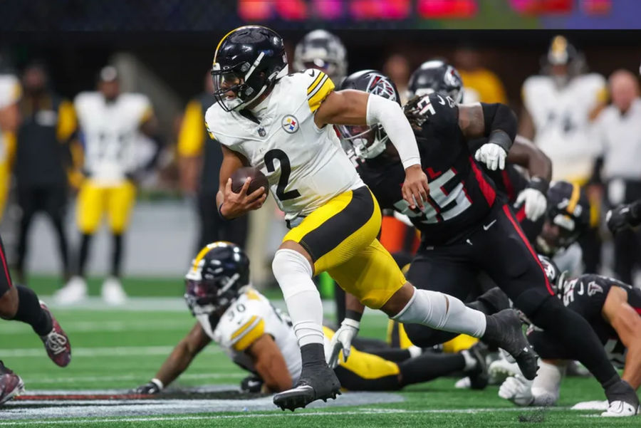 Sep 8, 2024; Atlanta, Georgia, USA; Pittsburgh Steelers quarterback Justin Fields (2) runs the ball against the Atlanta Falcons in the second quarter at Mercedes-Benz Stadium. Mandatory Credit: Brett Davis-Imagn Images