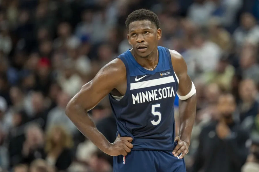 Nov 4, 2024; Minneapolis, Minnesota, USA; Minnesota Timberwolves guard Anthony Edwards (5) looks on against the Charlotte Hornets in the first half at Target Center. Mandatory Credit: Jesse Johnson-Imagn Images