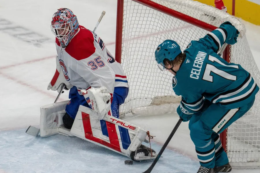 Feb 4, 2025; San Jose, California, USA; San Jose Sharks center Macklin Celebrini (71) shot is blocked by Montreal Canadiens goaltender Sam Montembeault (35) during the third period at SAP Center at San Jose. Mandatory Credit: Neville E. Guard-Imagn Images