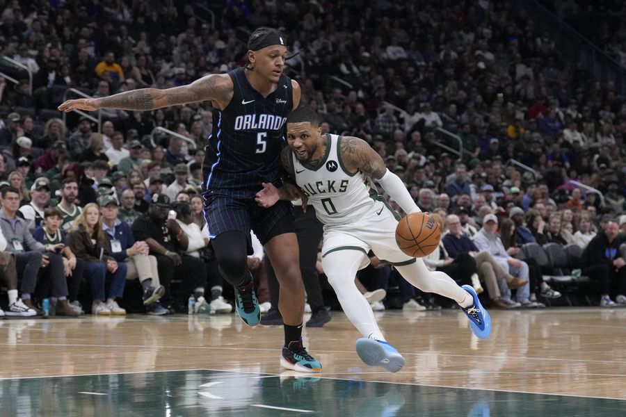 Magic win close one against Bucks to end skid