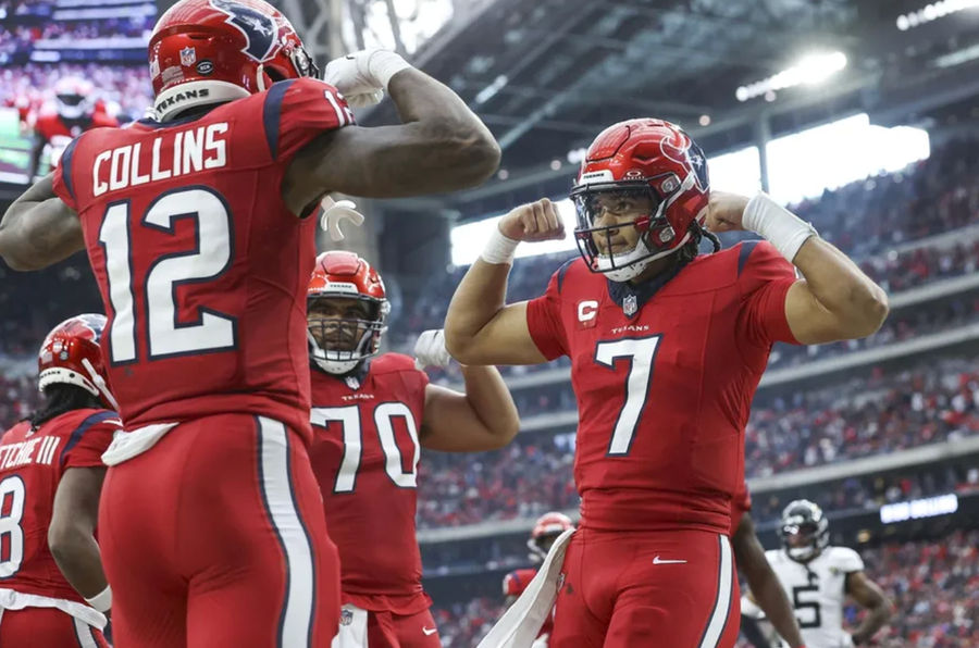 Houston Texans quarterback C.J. Stroud (7) celebrates with wide receiver Nico Collins (12) after a touchdown during the fourth quarter against the Jacksonville Jaguars at NRG Stadium. Mandatory Credit: Troy Taormina-USA TODAY Sports