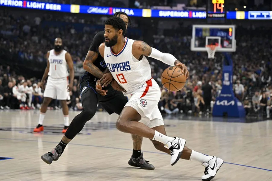 May 3, 2024; Dallas, Texas, USA; LA Clippers forward Paul George (13) drives to the basket against the Dallas Mavericks during the first quarter during game six of the first round for the 2024 NBA playoffs at American Airlines Center. Mandatory Credit: Jerome Miron-USA TODAY Sports