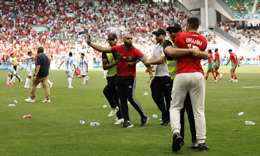 Argentina upset in chaotic soccer opener; France blanks U.S.